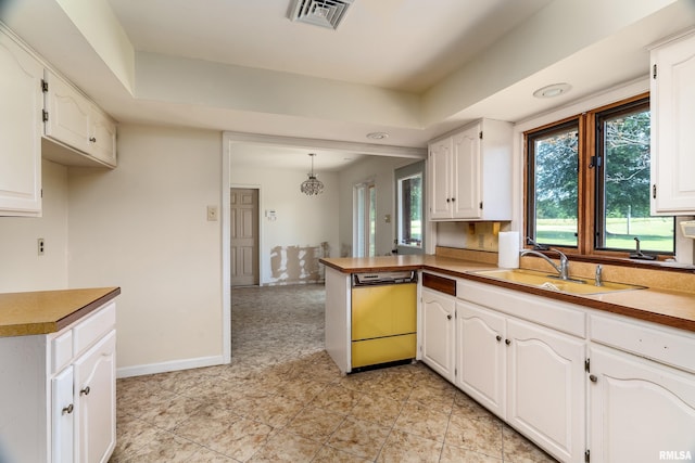 2723 Country Club Rd, Carbondale, IL 62901 - kitchen with dishwasher, plenty of natural light, and white cabinetry