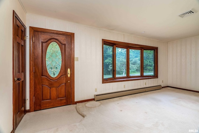 2723 Country Club Rd, Carbondale, IL 62901 - foyer featuring a baseboard radiator, carpet, and ornamental molding