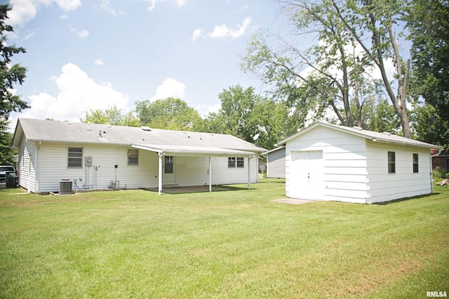 203 Skyline Dr, Marion, IL 62959 - rear view of property with a yard and an outbuilding