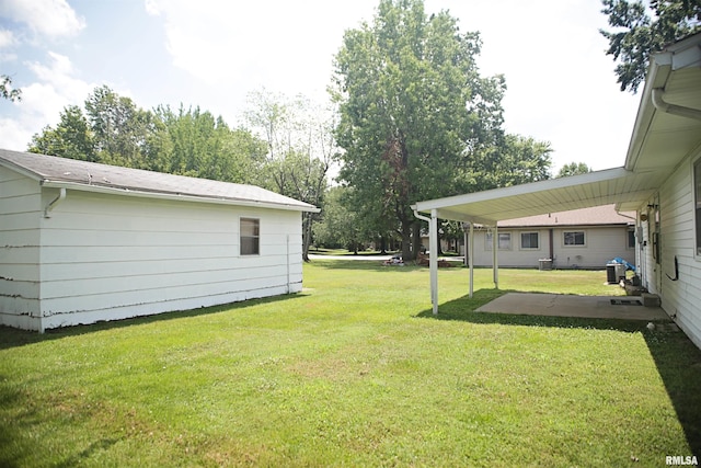 203 Skyline Dr, Marion, IL 62959 - view of grassy yard featuring a patio