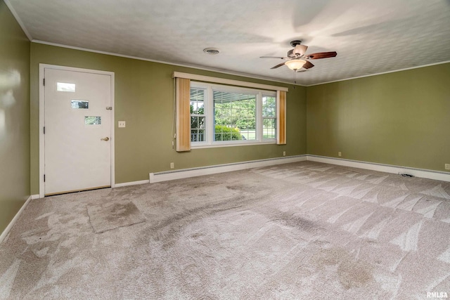 4341 Market Rd, Marion, IL 62959 - carpeted empty room featuring baseboard heating, ceiling fan, and crown molding