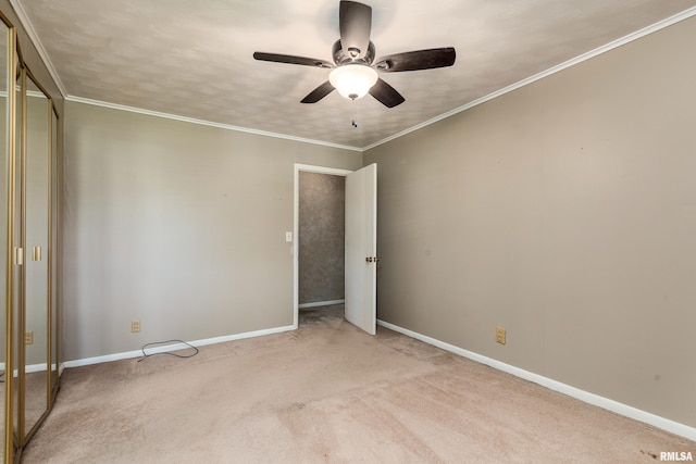 4341 Market Rd, Marion, IL 62959 - unfurnished bedroom with light colored carpet, a ceiling fan, a closet, and ornamental molding