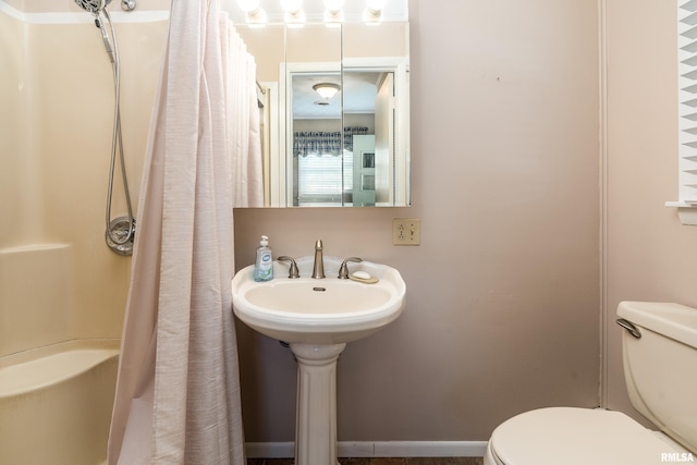 4341 Market Rd, Marion, IL 62959 - bathroom with toilet and a shower with shower curtain