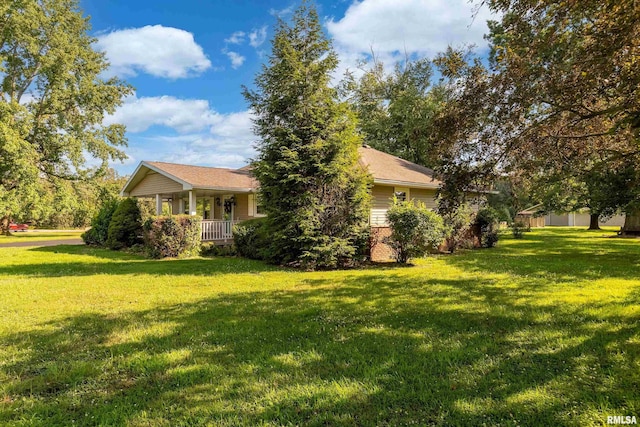 4341 Market Rd, Marion, IL 62959 - view of front of property with a porch and a front lawn