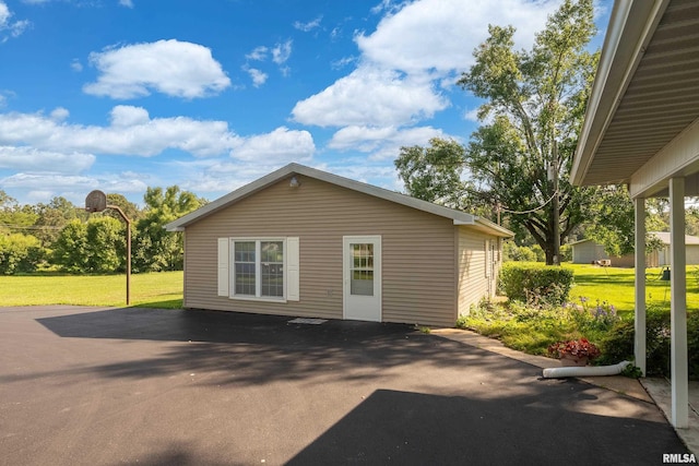 4341 Market Rd, Marion, IL 62959 - back of property with a lawn and asphalt driveway