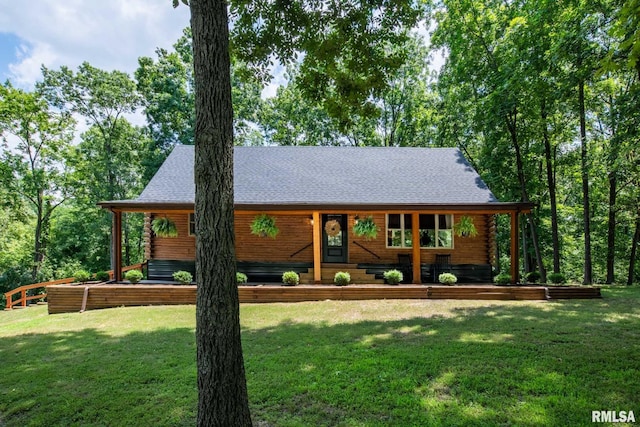 14682 White Birch Ct, Benton, IL 62812 - log cabin with log siding, a front yard, and a shingled roof