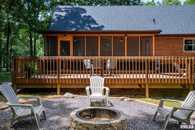 14682 White Birch Ct, Benton, IL 62812 - back of property featuring an outdoor fire pit, roof with shingles, a sunroom, a patio area, and a deck