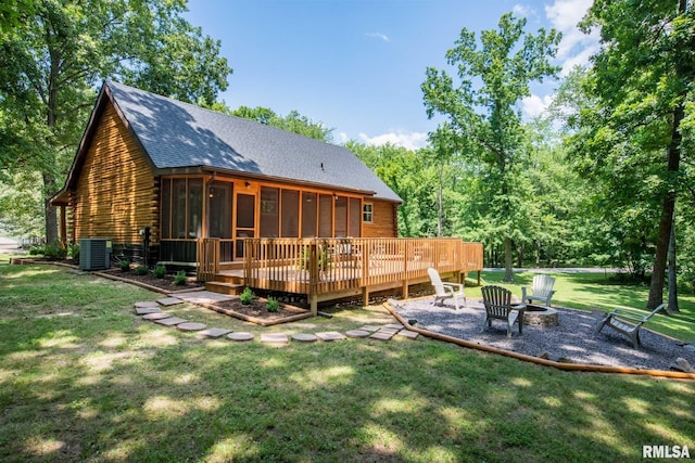 14682 White Birch Ct, Benton, IL 62812 - back of property featuring a sunroom, a fire pit, a wooden deck, a yard, and roof with shingles