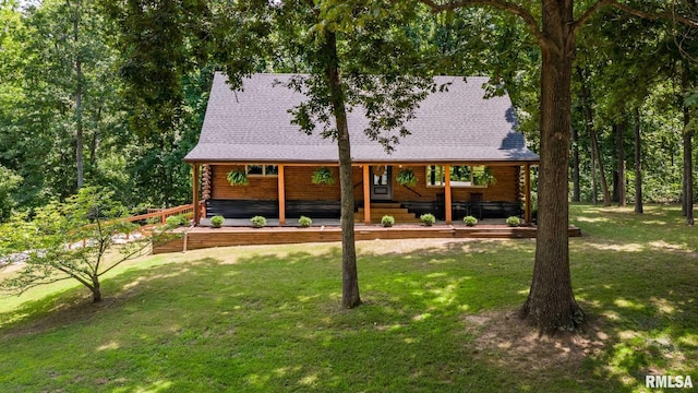14682 White Birch Ct, Benton, IL 62812 - log home featuring log exterior, a front yard, and a porch