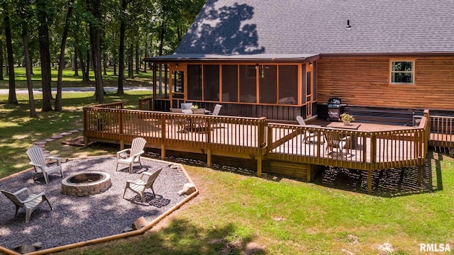 14682 White Birch Ct, Benton, IL 62812 - rear view of house featuring a fire pit, a sunroom, a deck, a shingled roof, and a lawn