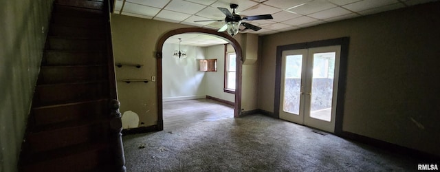 22776 Olive St, Olive Branch, IL 62969 - carpeted spare room with french doors, arched walkways, a paneled ceiling, and ceiling fan