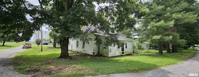 22776 Olive St, Olive Branch, IL 62969 - view of side of property featuring a lawn