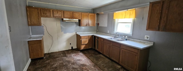 22776 Olive St, Olive Branch, IL 62969 - kitchen with under cabinet range hood, brown cabinets, and light countertops