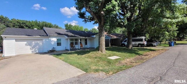 1420 N 17th St, Mount Vernon, IL 62864 - ranch-style house featuring concrete driveway, a front lawn, and a garage