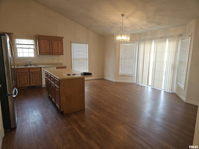 1905 N Dawn Dr, Marion, IL 62959 - kitchen featuring freestanding refrigerator, dishwasher, a chandelier, dark wood-style flooring, and vaulted ceiling
