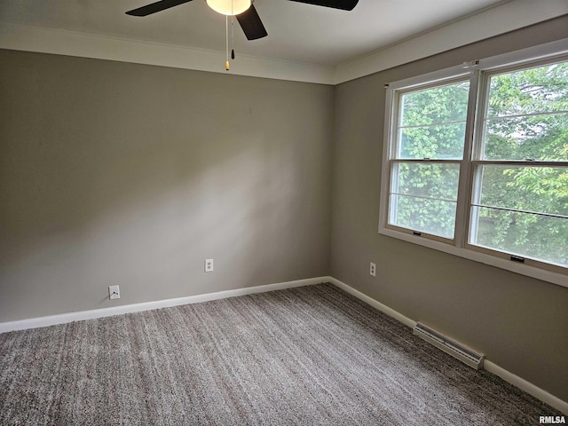 2908 W Kent Dr, Carbondale, IL 62901 - unfurnished room with a ceiling fan, healthy amount of natural light, and carpet flooring