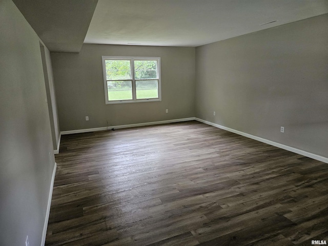 2908 W Kent Dr, Carbondale, IL 62901 - unfurnished room with dark wood-type flooring and baseboards