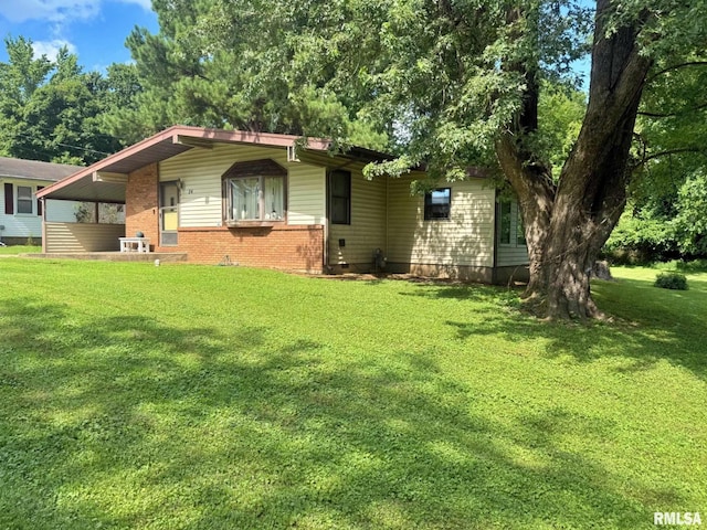 24 Adkins St, Metropolis, IL 62960 - view of front of home with a front yard