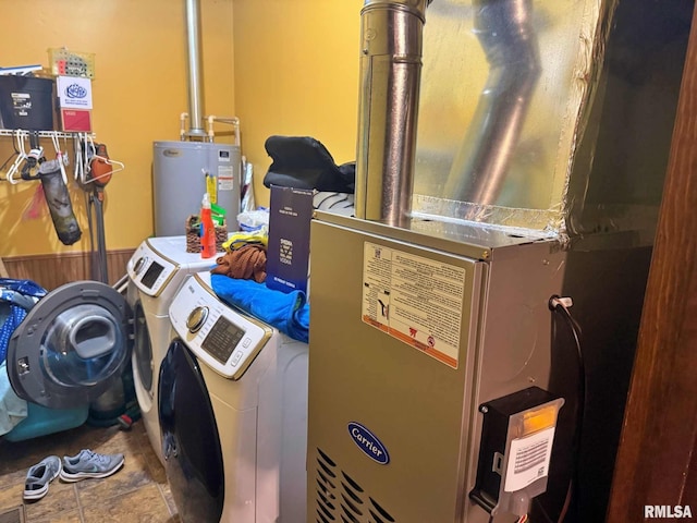 24 Adkins St, Metropolis, IL 62960 - laundry room with washer and clothes dryer, water heater, and heating unit
