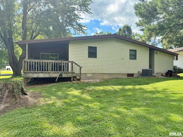 24 Adkins St, Metropolis, IL 62960 - rear view of house featuring a lawn, a deck, and crawl space