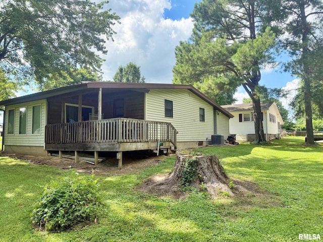 24 Adkins St, Metropolis, IL 62960 - back of property featuring a yard and a deck