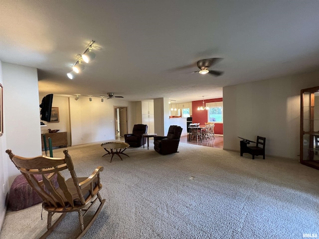 1308 Shawnee Trl, Carterville, IL 62918 - sitting room with ceiling fan, carpet floors, and track lighting