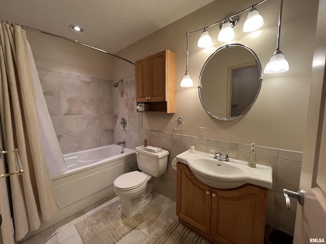 1308 Shawnee Trl, Carterville, IL 62918 - full bath featuring tile walls, vanity, shower / tub combo with curtain, tile patterned floors, and wainscoting
