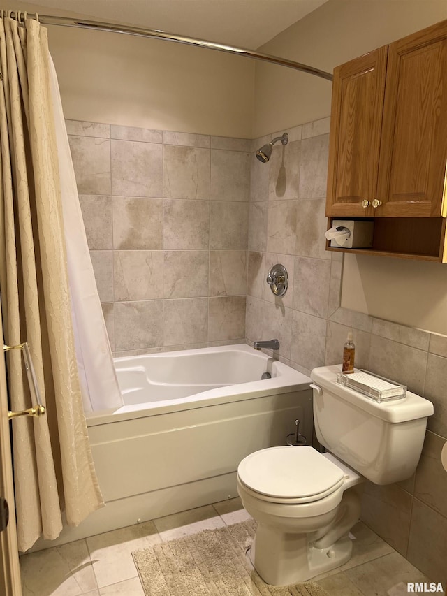1308 Shawnee Trl, Carterville, IL 62918 - full bath featuring shower / tub combo with curtain, tile patterned flooring, and tile walls