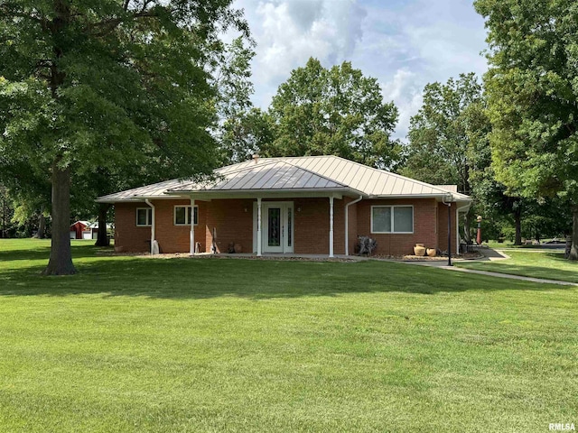 1308 Shawnee Trl, Carterville, IL 62918 - ranch-style house with a standing seam roof, a front lawn, a metal roof, and brick siding