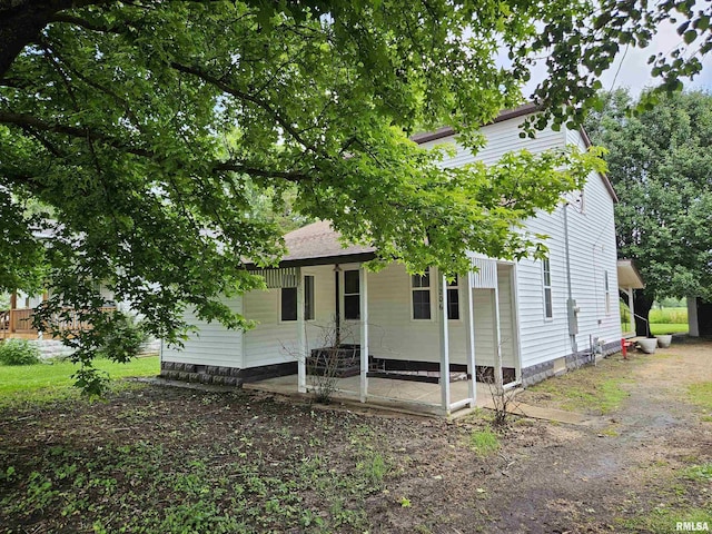1206 N 14th St, Murphysboro, IL 62966 - view of front facade featuring covered porch