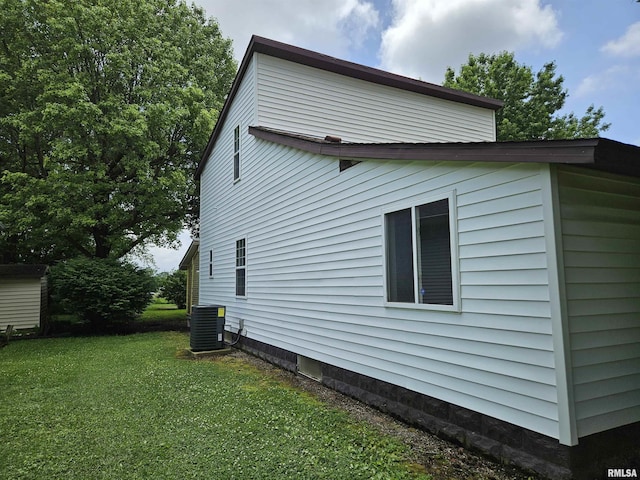 1206 N 14th St, Murphysboro, IL 62966 - view of property exterior with a lawn and a cooling unit