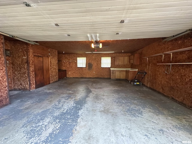 215 S Sunny Slope St, West Frankfort, IL 62896 - garage featuring a garage door opener