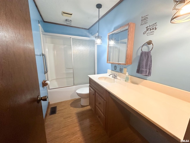 215 S Sunny Slope St, West Frankfort, IL 62896 - full bathroom featuring vanity, wood finished floors, and shower / bath combination with glass door