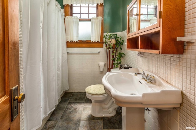 2011 Logan St, Murphysboro, IL 62966 - full bath with stone finish flooring and curtained shower