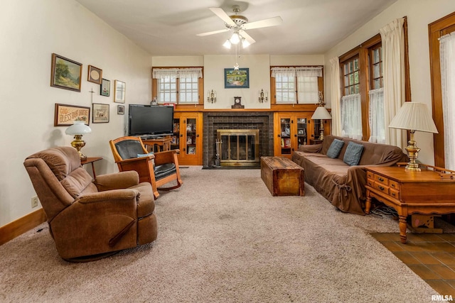 2011 Logan St, Murphysboro, IL 62966 - living area featuring a ceiling fan and a fireplace