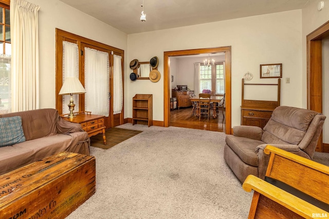 2011 Logan St, Murphysboro, IL 62966 - living room with a chandelier and carpet flooring
