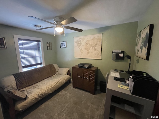 204 Oak St, Odin, IL 62870 - office area with dark colored carpet and a ceiling fan