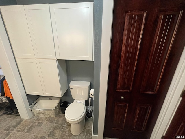 204 Oak St, Odin, IL 62870 - bathroom with toilet and baseboards