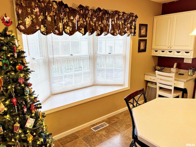 43 E Lakewood Dr, Metropolis, IL 62960 - tiled dining space with plenty of natural light