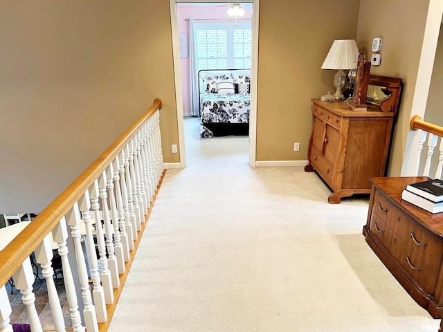 43 E Lakewood Dr, Metropolis, IL 62960 - corridor featuring baseboards and light carpet