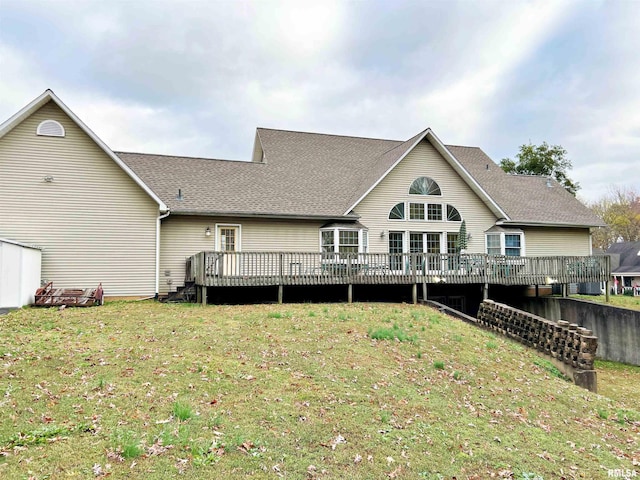 43 E Lakewood Dr, Metropolis, IL 62960 - back of house with a wooden deck, a yard, and roof with shingles