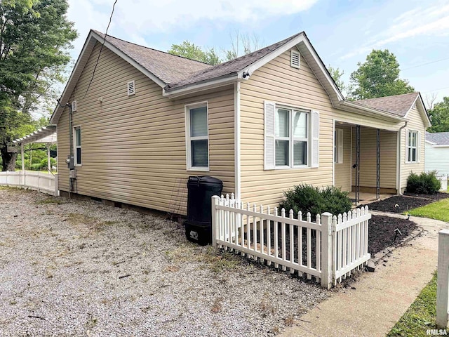 501 Cedar Creek Rd, Makanda, IL 62958 - view of side of property featuring a shingled roof and crawl space