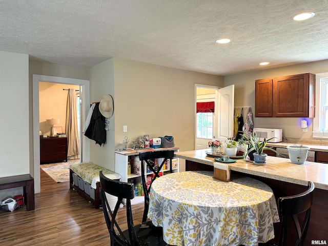 501 Cedar Creek Rd, Makanda, IL 62958 - dining space featuring a textured ceiling, dark wood-type flooring, and recessed lighting