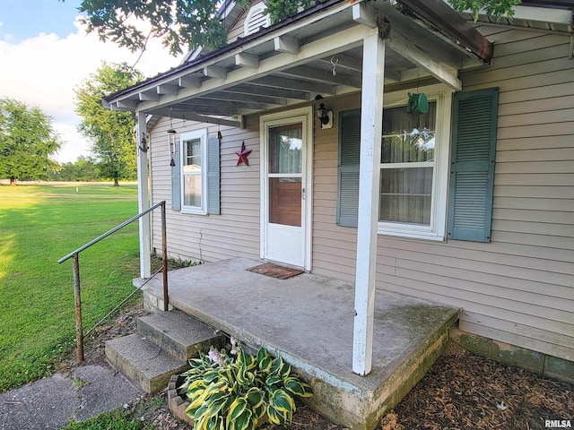 113 SW Mead St, Clay City, IL 62824 - property entrance with a yard