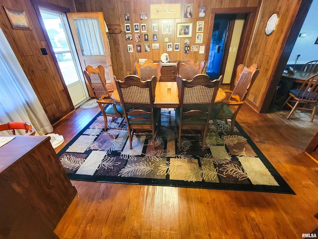 113 SW Mead St, Clay City, IL 62824 - dining room featuring wood finished floors and wooden walls