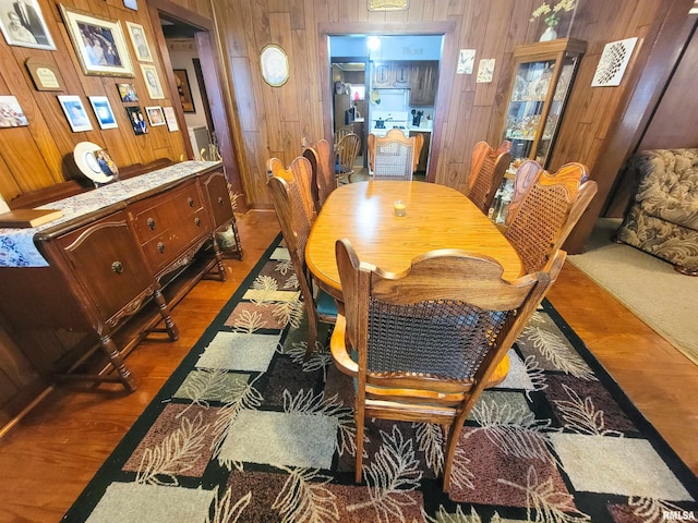 113 SW Mead St, Clay City, IL 62824 - dining room with wooden walls and wood finished floors