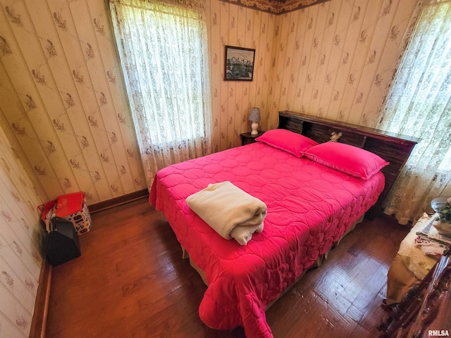 113 SW Mead St, Clay City, IL 62824 - bedroom featuring hardwood / wood-style floors and wallpapered walls