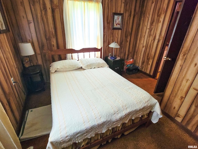 113 SW Mead St, Clay City, IL 62824 - bedroom featuring carpet and wood walls