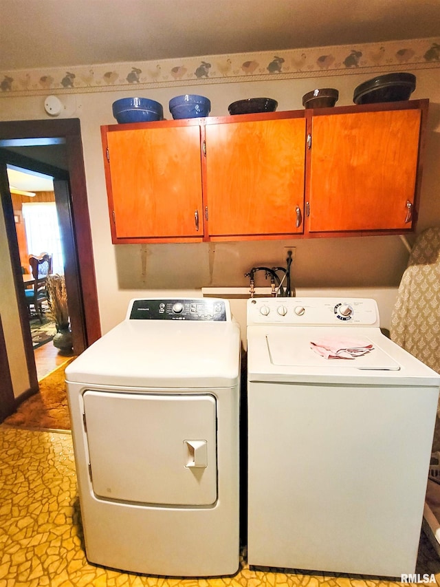 113 SW Mead St, Clay City, IL 62824 - laundry area featuring cabinet space and independent washer and dryer