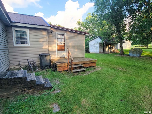 113 SW Mead St, Clay City, IL 62824 - view of green lawn with a shed and a deck